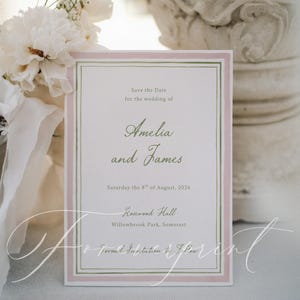 May include: A formal wedding invitation with a pink and green border. The text reads "Save the Date for the wedding of Amelia and James, Saturday the 8th of August, 2026, Rosewood Hall, Willowbrook Park, Somerset."