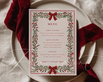 May include: A Christmas menu card with a red border and a wreath design of green leaves and red berries. The menu includes First Course, Main Course, and Dessert options. The words "Merry Christmas" are at the bottom.