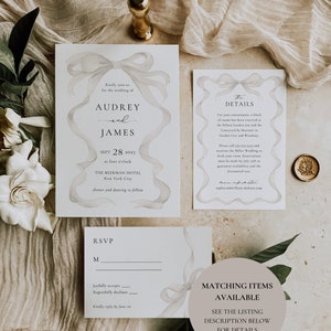 May include: A wedding invitation suite with a watercolor design of a white ribbon bow. The invitation includes the names Audrey and James, the date September 28, 2027, and the location The Beekman Hotel in New York City. The RSVP card includes a space for the guest's name and a line for them to indicate if they will be attending. The details card includes information about the wedding, including the hotel block and contact information. The final card states "Matching Items Available" and directs the reader to the listing description for details.