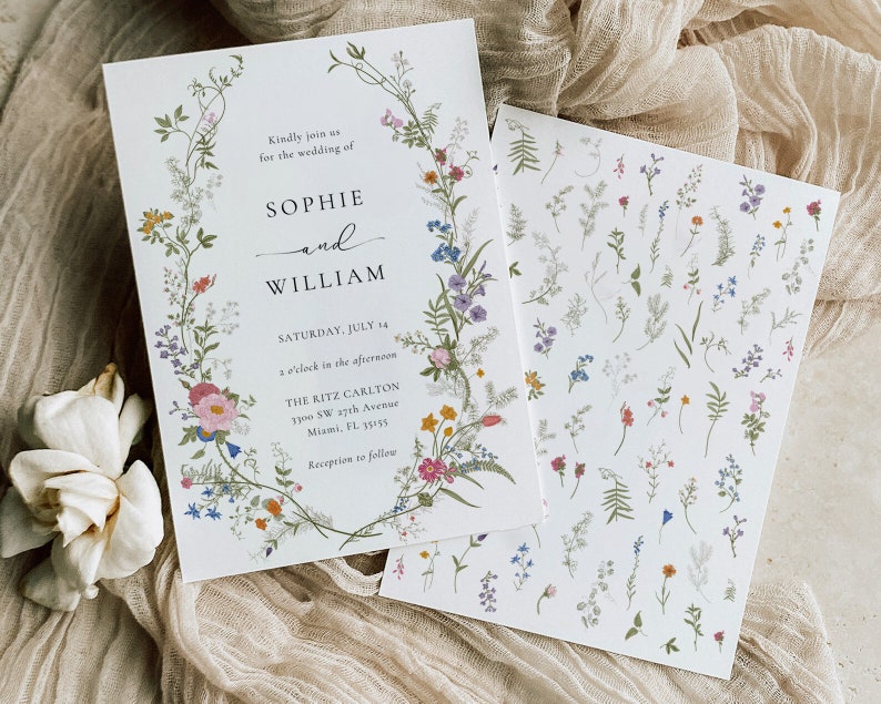 May include: Wedding invitation with floral border and text that reads "Kindly join us for the wedding of Sophie and William, Saturday, July 14, 2 o'clock in the afternoon, The Ritz Carlton, 1900 SW 37th Avenue, Miami, FL 33155, Reception to follow."