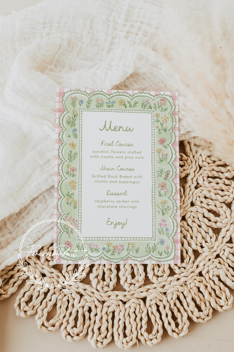 May include: A menu card with a floral design. The menu features a pink gingham background and a green border with flowers. The menu includes the text "Menu", "First Course", "Main Course", "Dessert", and "Enjoy!"