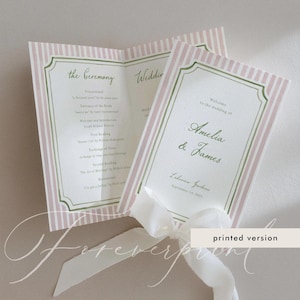 May include: A folded wedding program with pink and white vertical stripes, featuring a green decorative border and white ribbon. The text reads: Welcome to the wedding of Amelia & James, Lakeside Gardens, September 14, 2029, and the Ceremony details.