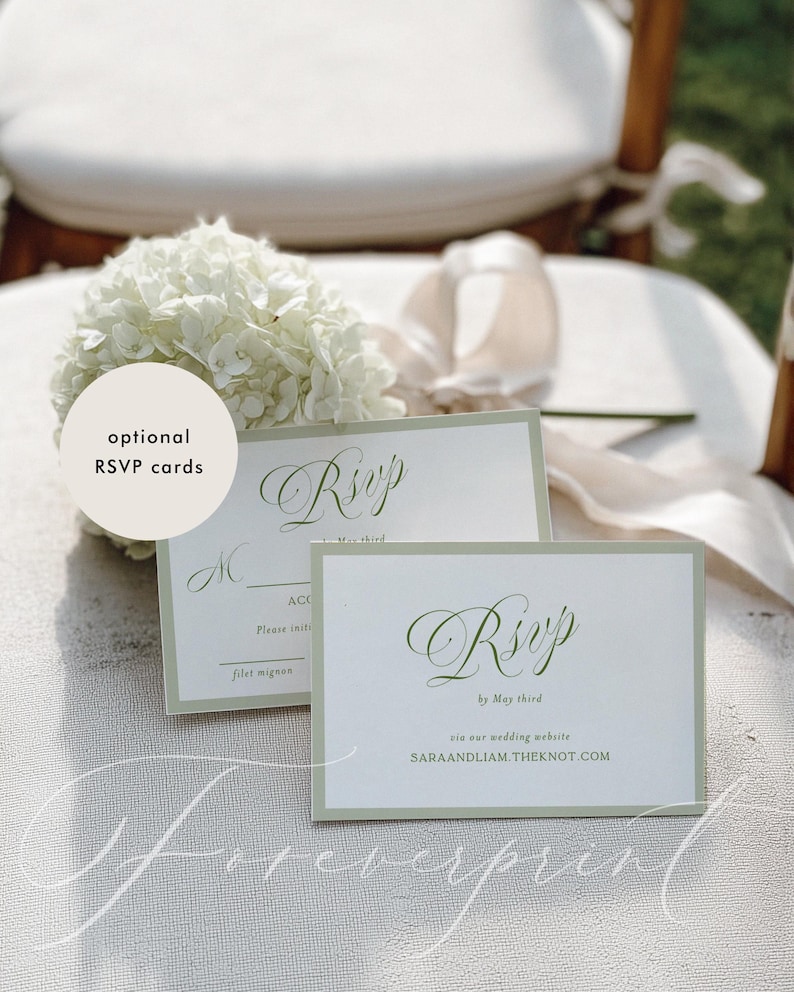 May include: Two white RSVP cards with green borders and elegant script, one with the word "RSVP" and the other with a website address. A white floral arrangement and the words "optional RSVP cards" are also visible.