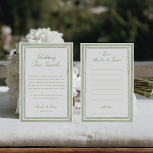 May include: Two wedding time capsule cards with a sage green border. One card reads "Wedding Time Capsule" and includes instructions. The other card is addressed to "Amelia & James" with lines for writing a message.