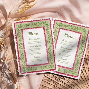May include: Two menu cards with a watercolour design. Each card has a green border with a floral pattern and a red scalloped edge. The menu includes courses like "First Course" and "Main Course."