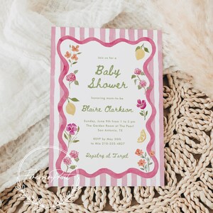 May include: Baby shower invitation with pink stripes and floral accents. The invitation features the text "Baby Shower" and details for Blaire Clarkson's baby shower, including date, time, and location. RSVP information is also included.