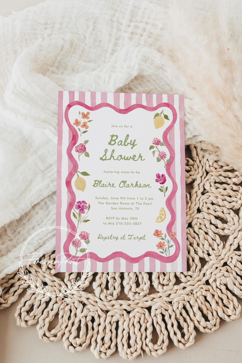 May include: Baby shower invitation with pink stripes and floral accents. The invitation features the text "Baby Shower" and details for Blaire Clarkson's baby shower, including date, time, and location. RSVP information is also included.