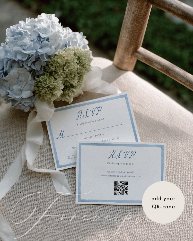 May include: Two RSVP cards with blue borders and text, placed on a neutral surface. The cards have the text "RSVP" and "Kindly reply by June 1st." A QR code is visible on one card. A bouquet of blue and green hydrangeas with white ribbon rests nearby.