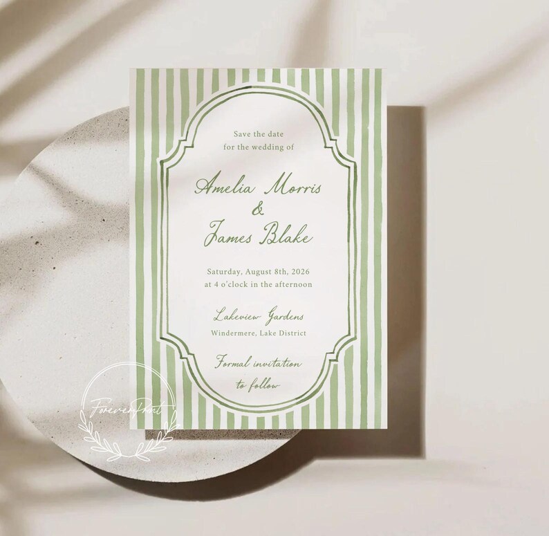 May include: A wedding invitation with a green and white striped design. The invitation includes the names "Amelia Morris & James Blake" and event details. The text reads "Save the date" and "Formal invitation to follow."
