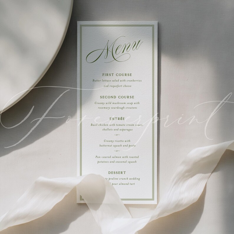 May include: A vertical menu card with a white background and a thin, light green border. The word "Menu" is written in elegant cursive at the top. The menu lists courses like "First Course" and "Second Course". A white ribbon is draped across the bottom.