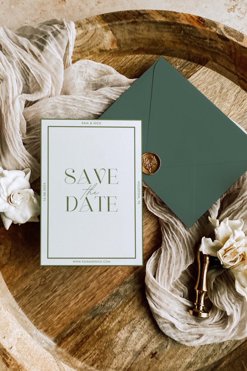 May include: A wedding invitation suite featuring a white card with the text "Save the Date" in green, a green envelope, and a gold wax seal. The card includes the date 16.08.2024 and the website kaiaandnick.com.
