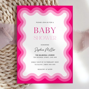 May include: Pink and white baby shower invitation with a wavy border. The invitation says "Please join us for a Baby Shower honoring Sophie Miller. The Balmoral Lounge, 124 George Street, EH2 4JN. Kindly RSVP by 10 February 2023 to Olivia 08XX XXX XXX. Registry at Myer."