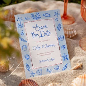 May include: A blue and white Save the Date card with seashell illustrations. The card reads "Save the Date" for Chloe & James, with the wedding date of July 5th, 2026, in Miami, Florida. The card is surrounded by seashells.