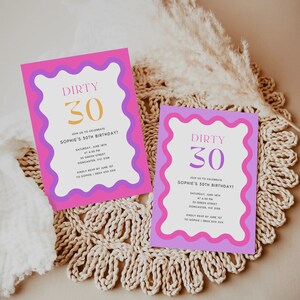 May include: Two pink and purple birthday party invitations with a wavy border. The invitations say "Dirty 30" and include details for Sophie's 30th birthday party.