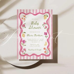 May include: A watercolor baby shower invitation with a pink and white striped background. The invitation features floral and lemon illustrations, with text that reads "Baby Shower" and details for the event.
