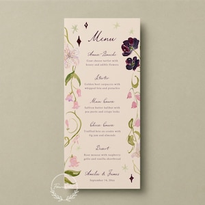 May include: A vertical rectangular menu card on cream paper featuring dark purple and pink floral illustrations along the sides. The text lists courses including Amuse-Bouche, Starter, Main Course, Cheese Course, and Dessert for Amelia & James.