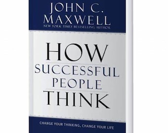 May include: A blue and white book titled "How Successful People Think" by John C. Maxwell, a New York Times bestselling author. The book cover features the title in large, bold font and the subtitle "Change your thinking, change your life" in smaller font.