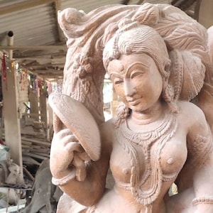 Red Stone Decorative Apsara statue