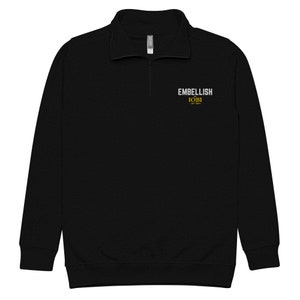 May include: Black quarter-zip sweatshirt with the word "EMBELLISH" in white and "IOBI" in gold lettering. The sweatshirt has a ribbed collar and cuffs. A casual, comfortable top for everyday wear.