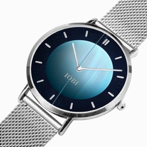 Modern ultratunn kvartsklocka i rostfritt stål med Uranus-design