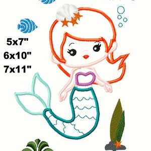 May include: Embroidered design of a mermaid with red hair, a purple seashell bra, and a turquoise tail. The mermaid is surrounded by blue and green sea life, including fish and seaweed. The design is available in three sizes: 5x7 inches, 6x10 inches, and 7x11 inches.