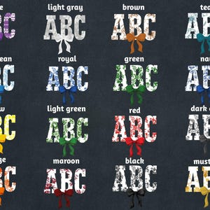 a grid of twelve different color variations of the letters "ABC" with bows, each variation representing a different color and style.