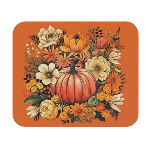 May include: A digital illustration of a pumpkin surrounded by a variety of fall flowers in shades of orange, yellow, and white. The background is a solid orange color.