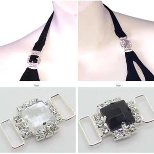 May include: Close-up of a black halter top with a decorative rhinestone buckle. The buckle is square-shaped with a large central stone and surrounded by smaller clear rhinestones. The buckle is silver-toned.