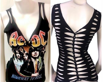May include: Black tank top featuring the AC/DC band logo and album art with the words "HIGHWAY TO HELL". The back of the tank top has a unique cut-out design with vertical slits and a braided detail.