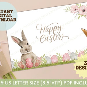 May include: A digital Easter print with a bunny holding a pink egg, and the words "Happy Easter" in script. The design includes floral accents and decorative Easter eggs. The text "Instant Digital Download" is also included.