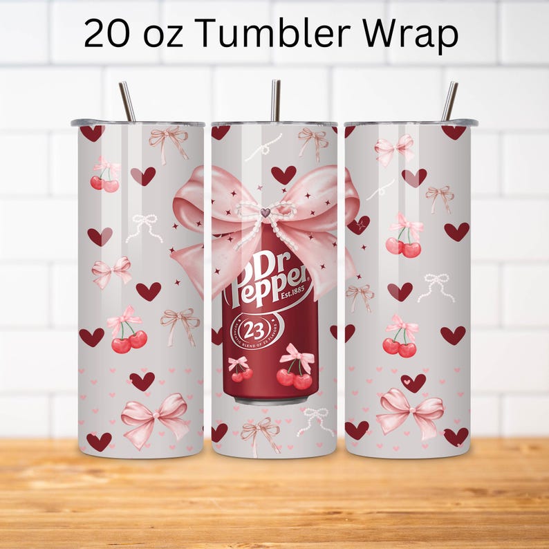 May include: A 20 ounce tumbler wrap design featuring a Dr Pepper can with a pink bow and cherries on a light gray background with pink hearts and bows.