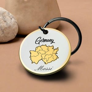 Deutschland Schlüsselanhänger Graviert Gold Reise Souvenir Individueller Name Geschenk für Ihn Ihre Landkarte Wahrzeichen Runde Metall Schlüsselanhänger Europa Andenken Charme
