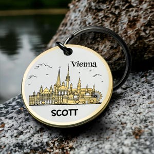 Wenen sleutelhanger gegraveerd gouden reissouvenir aangepaste naam cadeau voor hem haar Oostenrijk monument ronde metalen sleutelhanger historisch aandenken cadeau