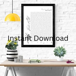 May include: A black and white printable wall art print featuring the lyrics to the song "Shake It Off" by Taylor Swift. The lyrics are printed in a simple font on a white background. The title of the song is written in a larger font and is angled diagonally. The print is framed in a black frame and is sitting on a wooden table with a vase of flowers and a book.