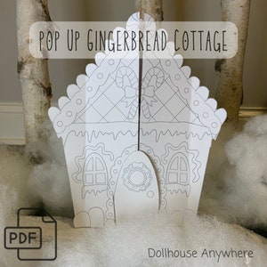 May include: A printable PDF pattern for a pop-up gingerbread cottage. The cottage is outlined in black and white and has a candy cane design on the roof. The text "POP UP GINGERBREAD COTTAGE" is at the top of the image. The text "Dollhouse Anywhere" is at the bottom of the image.