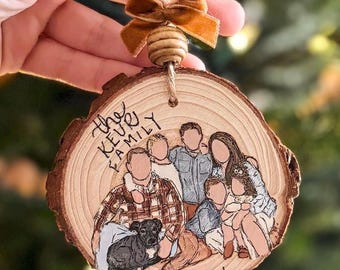 May include: A wooden family portrait ornament with a rustic bark edge. The ornament features a hand-painted family portrait with the text "the KEURI FAMILY" and the year "2024". A brown velvet bow and wooden bead adorn the top.