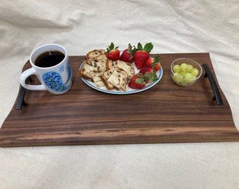 Walnut serving tray with handles.