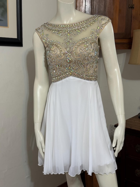 flare corset dress White Fit and Mini Available in sizes 0 Size:UK 16 (Buy Now) fullprice*june2026 Maeve Drop-Waist Mini Swing
