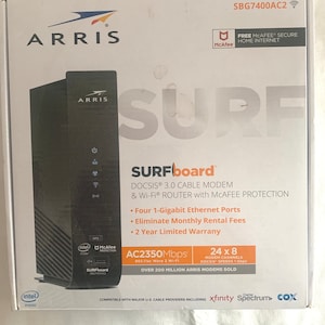 Arris Surf 3.0 Cable modem and Wifi router.   New in box.  Never used.