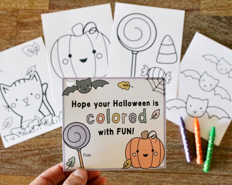 May include: A Halloween-themed card with a pumpkin, lollipop, and bat. The card says "Hope your Halloween is colored with FUN!"