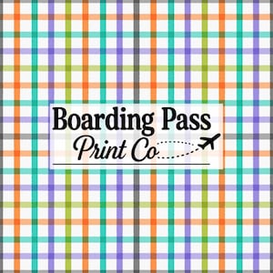May include: A repeating plaid pattern featuring intersecting horizontal and vertical lines in orange, teal, lime green, purple, and gray on a white background. Centered is a white rectangular label with the text Boarding Pass Print Co.