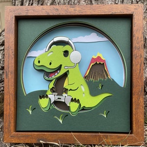 May include: A green dinosaur wearing headphones and holding a video game controller, with a volcano in the background. The dinosaur is in a 3D paper art style.