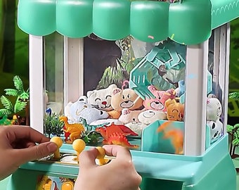 Dinosaur Doll Claw Machine Arcade Game. Candy Grabber & Prize Dispenser Vending Toy for Kids with Sound. Figure Toy Organizer Storage Box