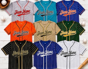 May include: A collection of nine short-sleeved baseball jerseys in various colors including gray, teal, blue, orange, tan, green, black, and white. Each jersey features vertical pinstripes, a button-down front, and the text Team Name in script.