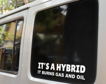 thumbnail image 2 of "It's A Hybrid: It Burns Gas And Oil" Funny Vinyl Decal - Bumper Sticker For Trucks & Outdoors 2 of 5