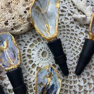 Decoration of a handmade oyster shell bottle stopper