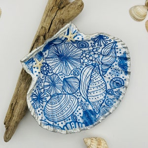 Blue and silver scallop shell decoration.