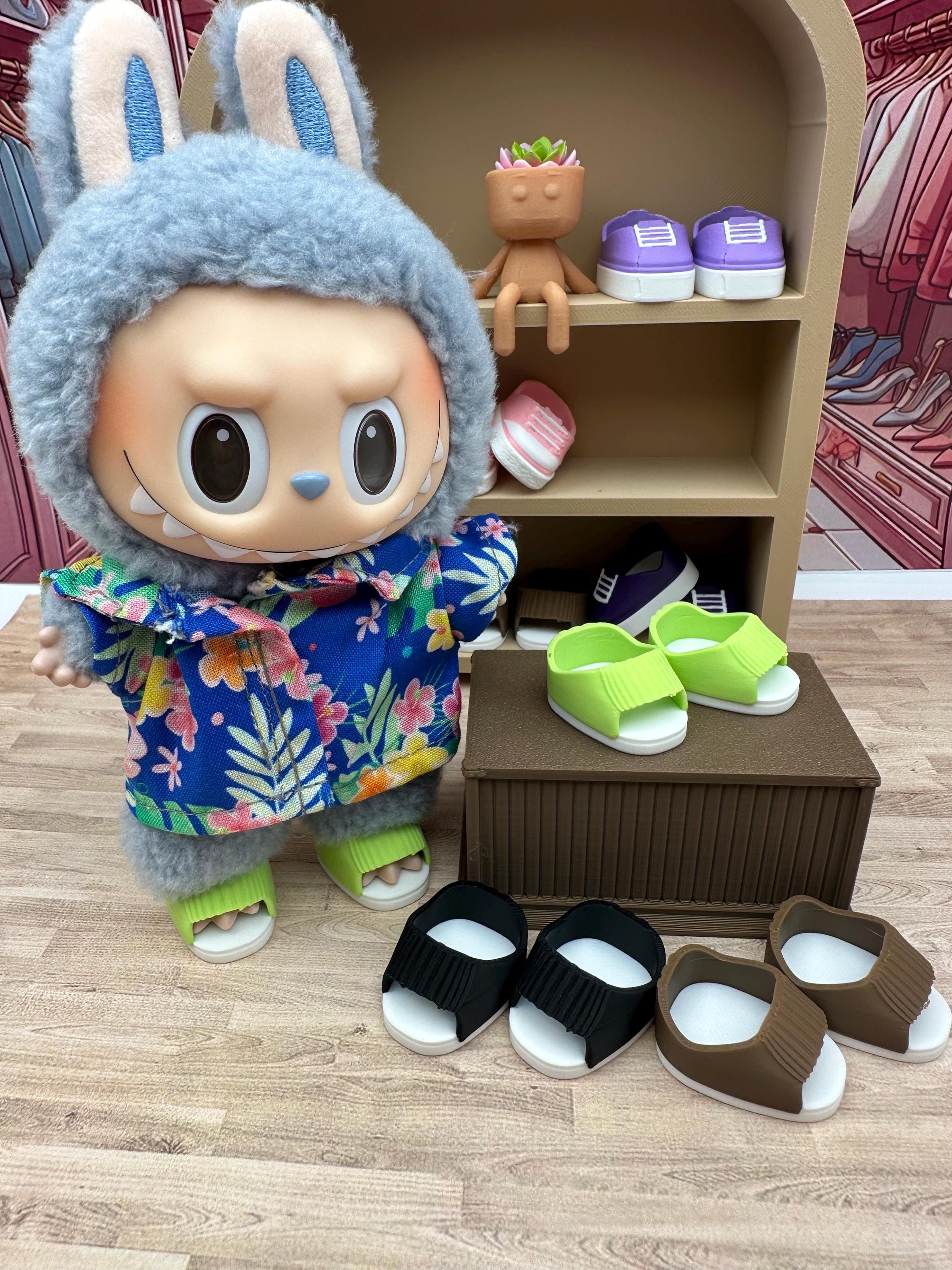 Labubu sized 3D printed shoes slides. Will fit 6.7” dolls. Stock or custom options.