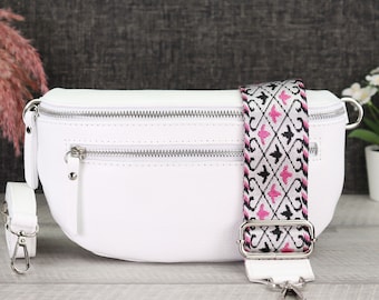 White women's leather bum bag with extra zipper pockets, women's leather shoulder bag with patterned straps, white leather crossbody bag