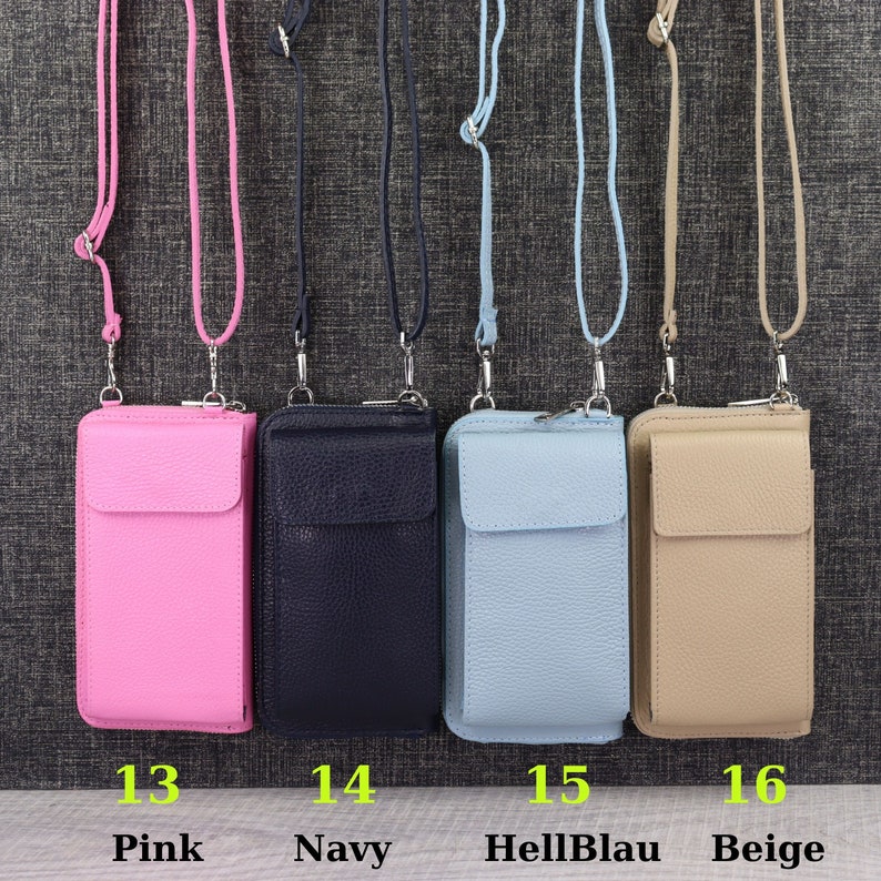 May include: Four different colored leather phone cases with a zipper closure and a long strap. The cases are pink, navy blue, light blue, and beige. The numbers 13, 14, 15, and 16 are printed below the cases, with the corresponding color names printed below the numbers.